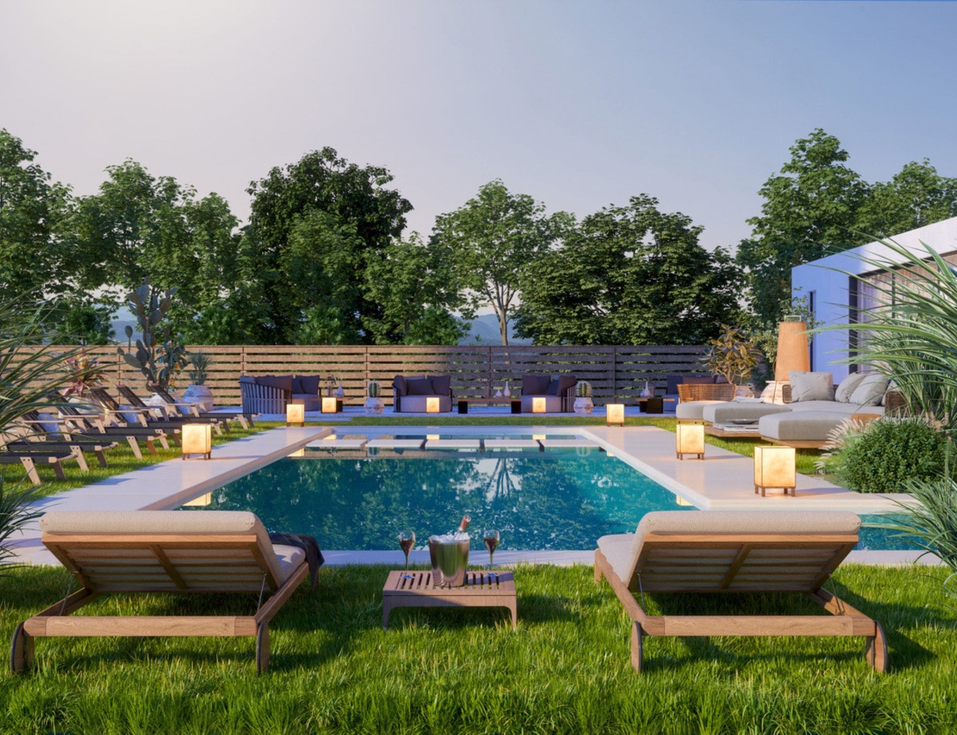 Contemporary pool at twilight with sun ledge, lounge chairs and lantern lighting