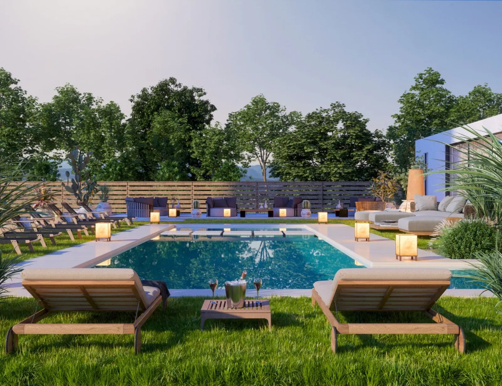 Contemporary pool at twilight with sun ledge, lounge chairs and lantern lighting