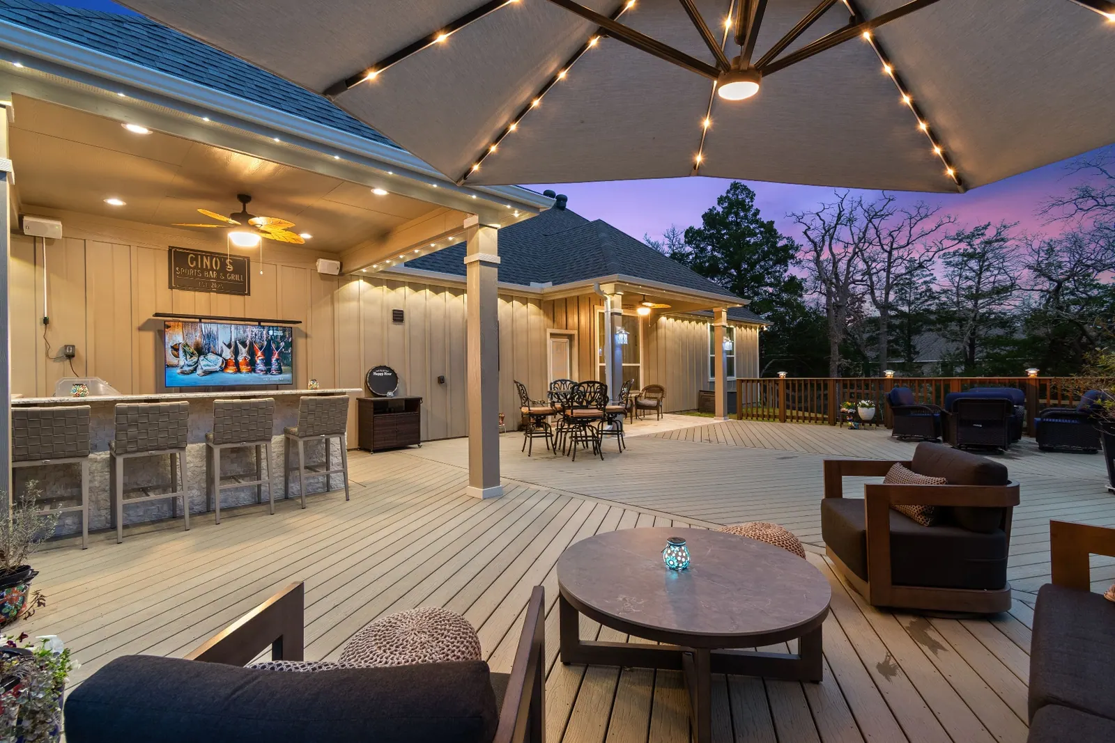 Freshly stained composite deck at dusk