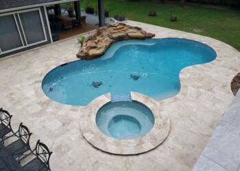 A Refreshing Pool Retreat Made for Texas Summers custom pool builder and remodeling