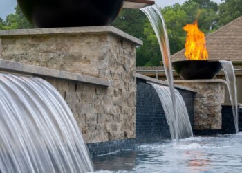 The Deck & Patio Company | Home custom pool with fire feature in houston