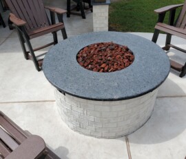 The Deck & Patio Company | Fire Pits and Features custom fire feature in the woodlands