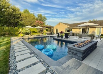 Chair, sofa, couch, bar and table. Hotel resort feel. Watch television, dine, have a drink or cocktail by the bar. Luxurious high end at home sanctuary, prime real estate. Modern indoor outdoor living entertainment space and patio under a pavilion pergola. poolside equipped with bar and gas fire pit with cascading waterfall. Luxury living.
