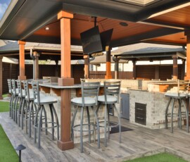 veranda, arbor, covered patio, outdoor kitchen